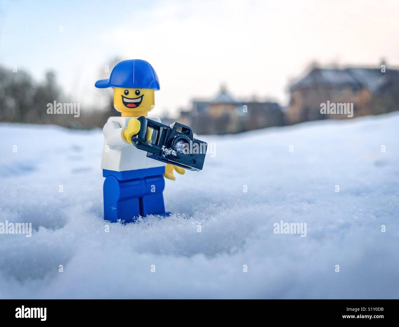 Lego Tog out taking pictures in the snow Stock Photo: 310994359 ...