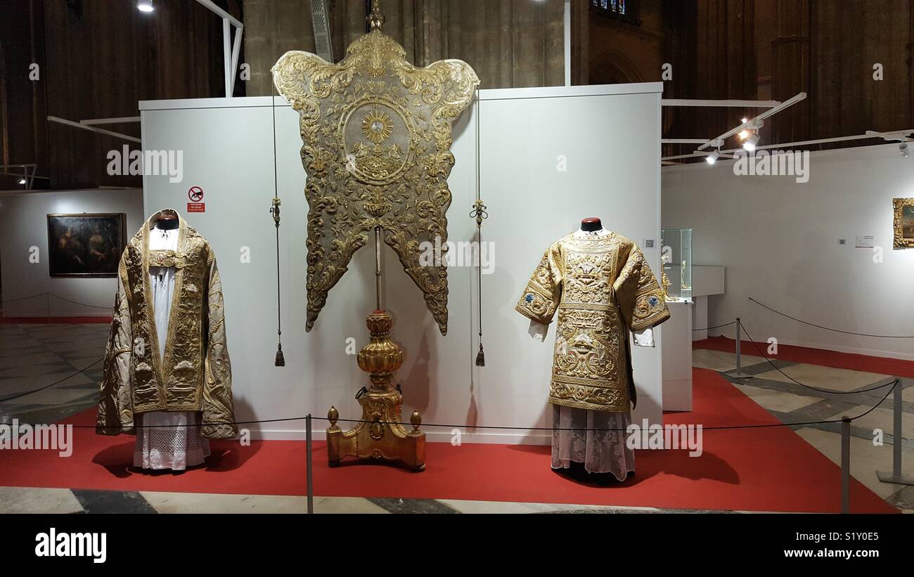 Religious clothes and costumes exposed in La Giralda Stock Photo