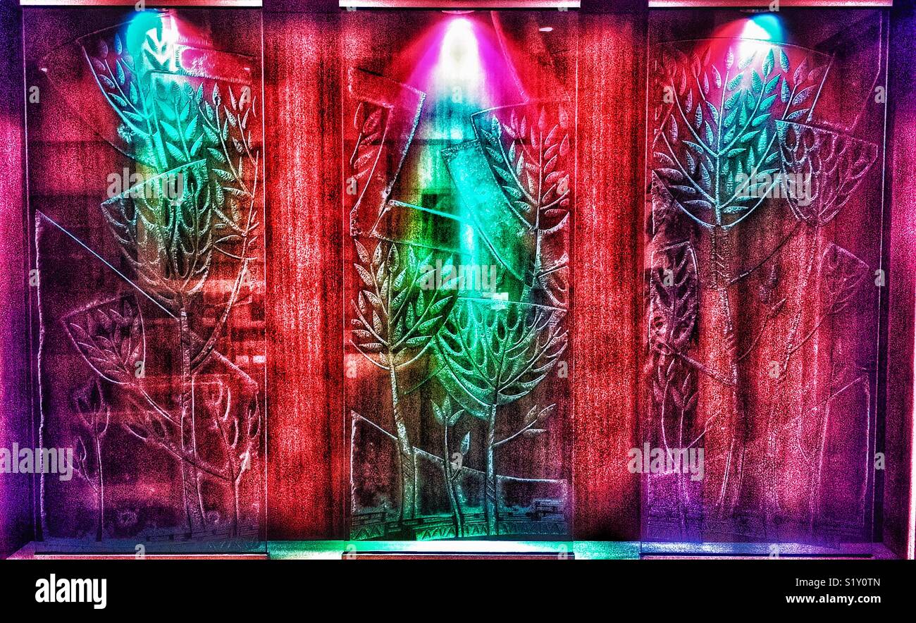 Stylized glass illuminated with colorful lights in a chapel - Smartphone Captured Stock Image