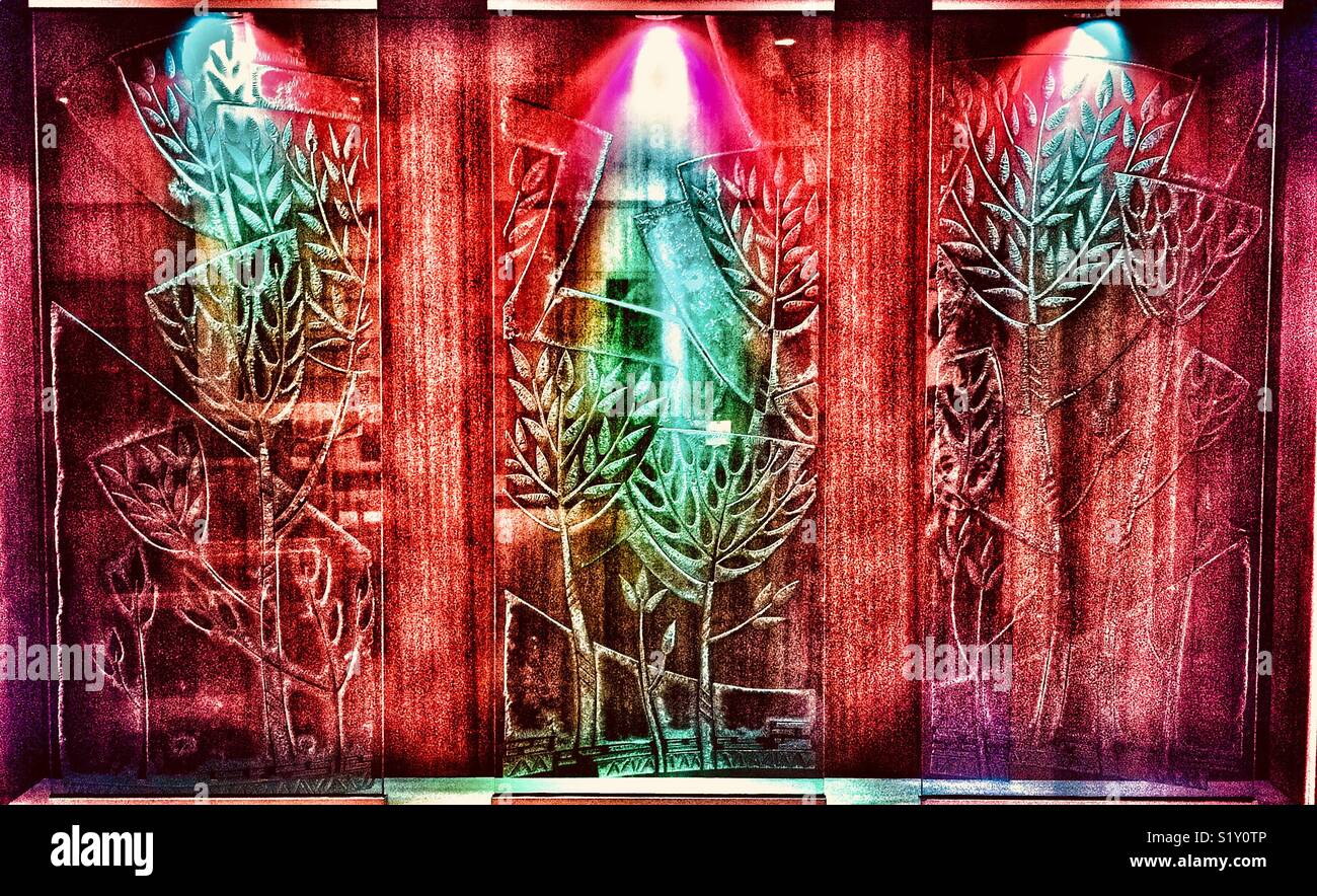 Stylized glass illuminated with colorful lights in a chapel - Smartphone Captured Stock Image