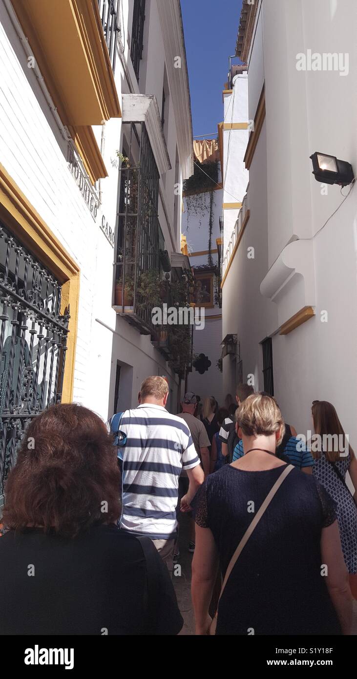 Tourists in the Old City of Sevilla, Spain Stock Photo