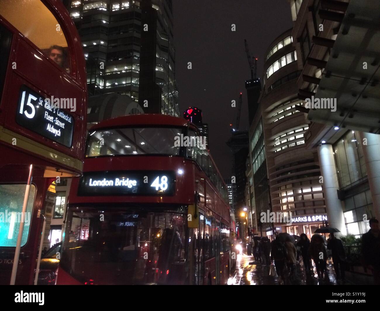 buses, cars and people on a busy street in London - Smartphone Captured Stock Image