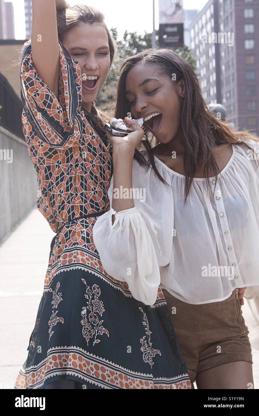 Fashion models Karlie Kloss and JourdanDunn - Smartphone Captured Stock Image