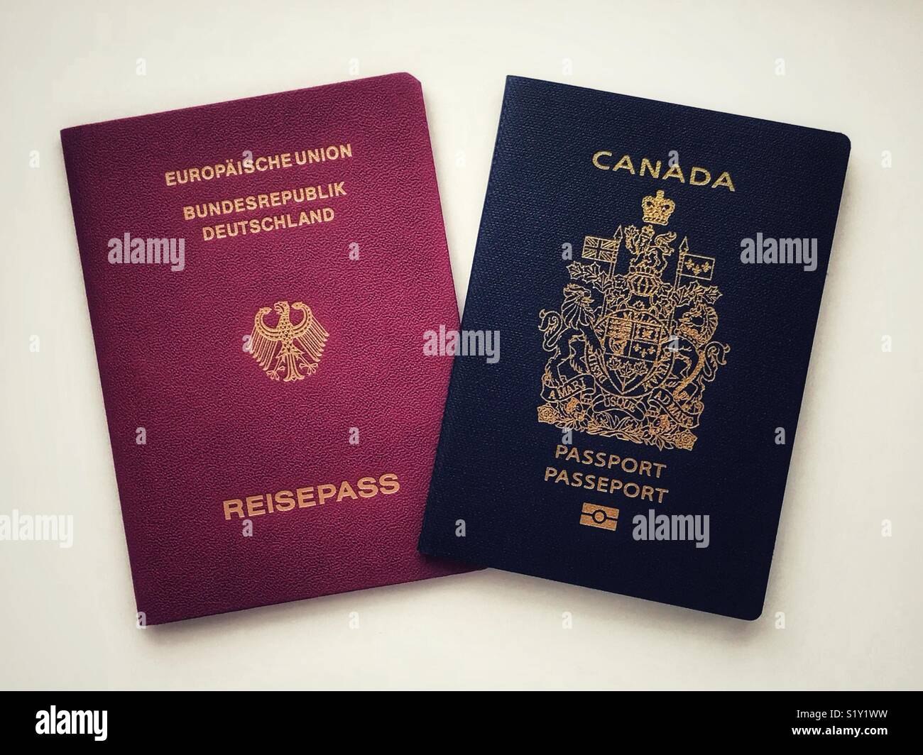 Two passports: European Union and Canada. Stock Photo