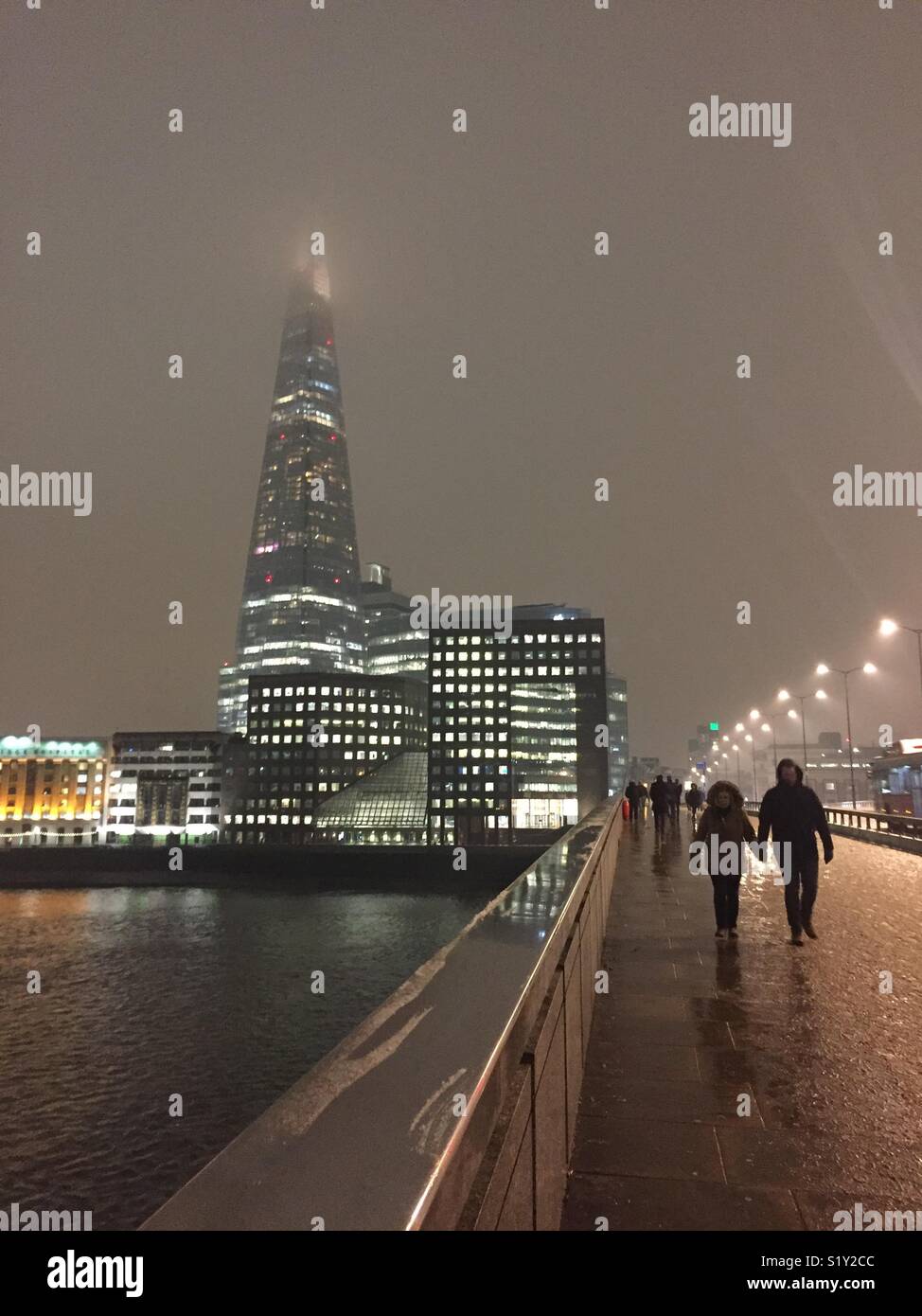 The Shard at night, in the fog and snow Stock Photo