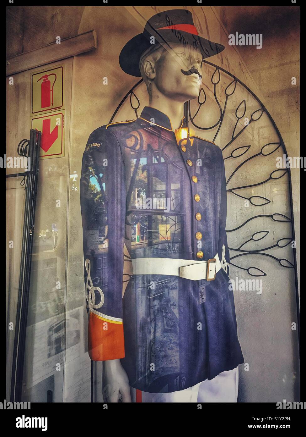 Mannequin in antique shop window. - Smartphone Captured Stock Image