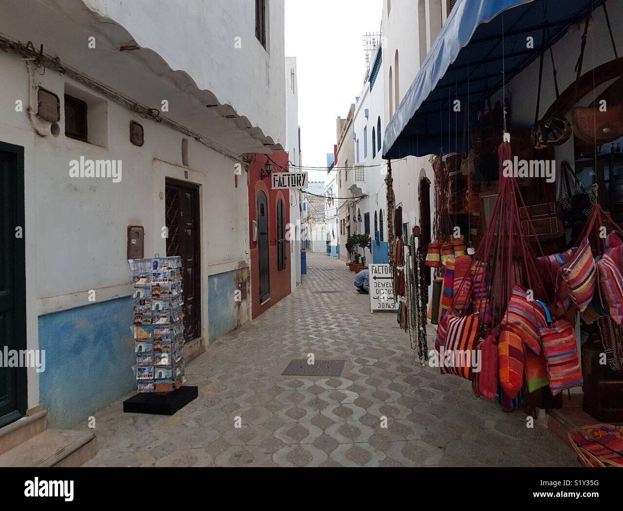 Souvenir shops in the Old City of Assilah, Morocco Stock Photo