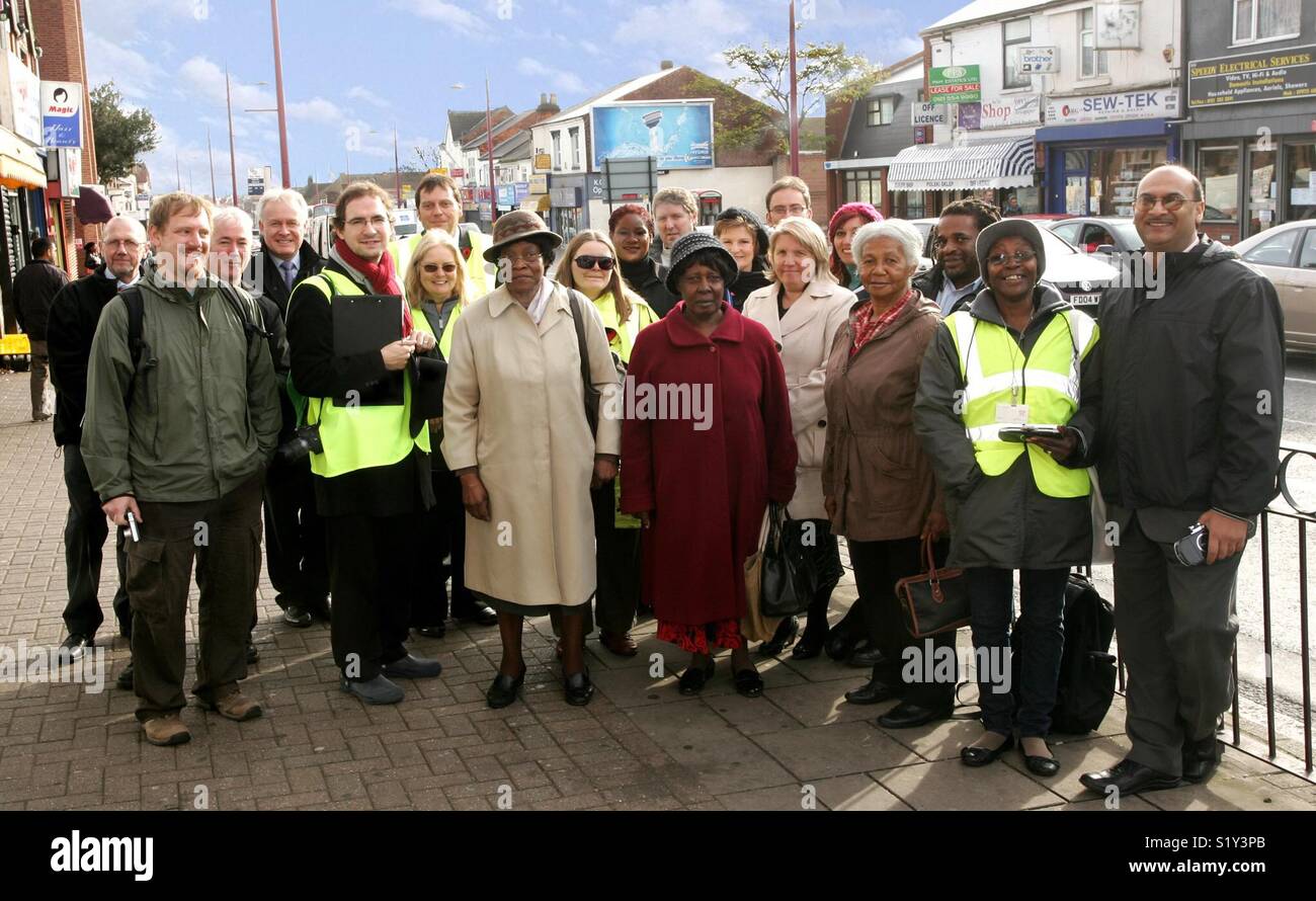 Multicultural active citizens gathered on the Soho Road, Handsworth, Birmingham - Smartphone Captured Stock Image