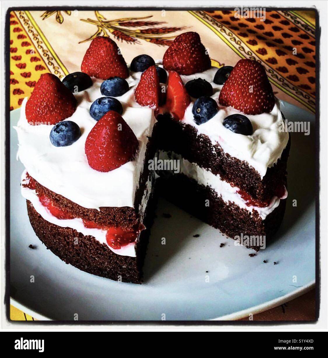 Chocolate strawberry and blueberry shortcake Stock Photo