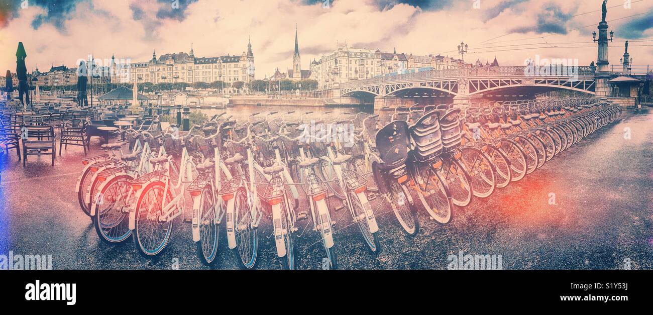 Rental bikes panorama and Djurgardsbron (Djurgarden Bridge), Djurgarden, Stockholm, Sweden, Scandinavia - Smartphone Captured Stock Image