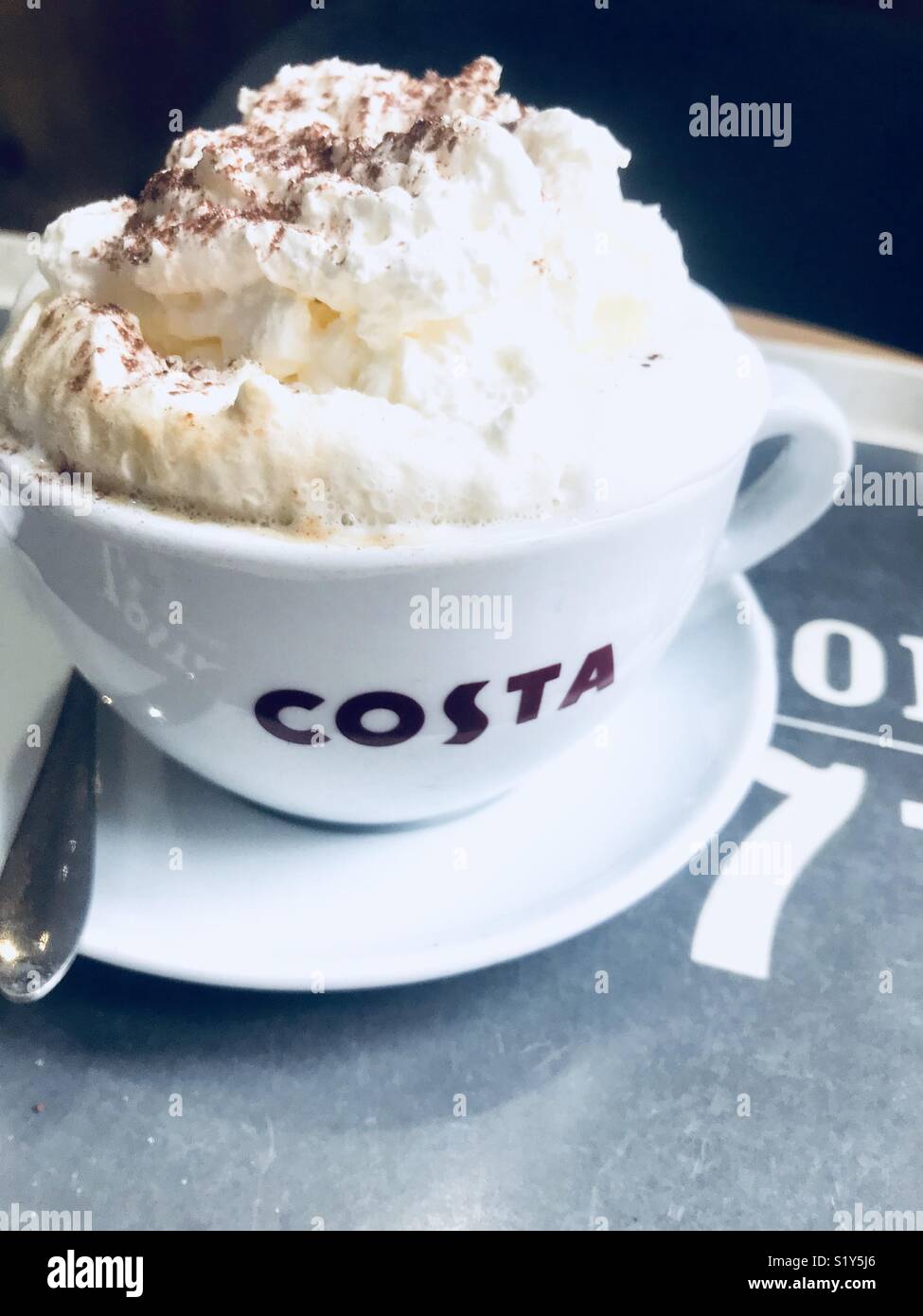 Costa coffee cappuccino with whipped cream Stock Photo