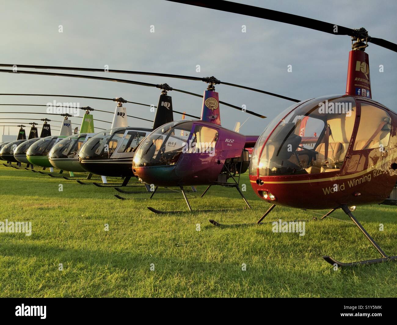 Robinson helicopters parked in a row Stock Photo Alamy