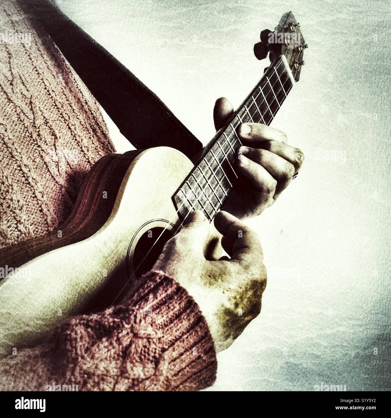 Woman playing ukulele - Smartphone Captured Stock Image