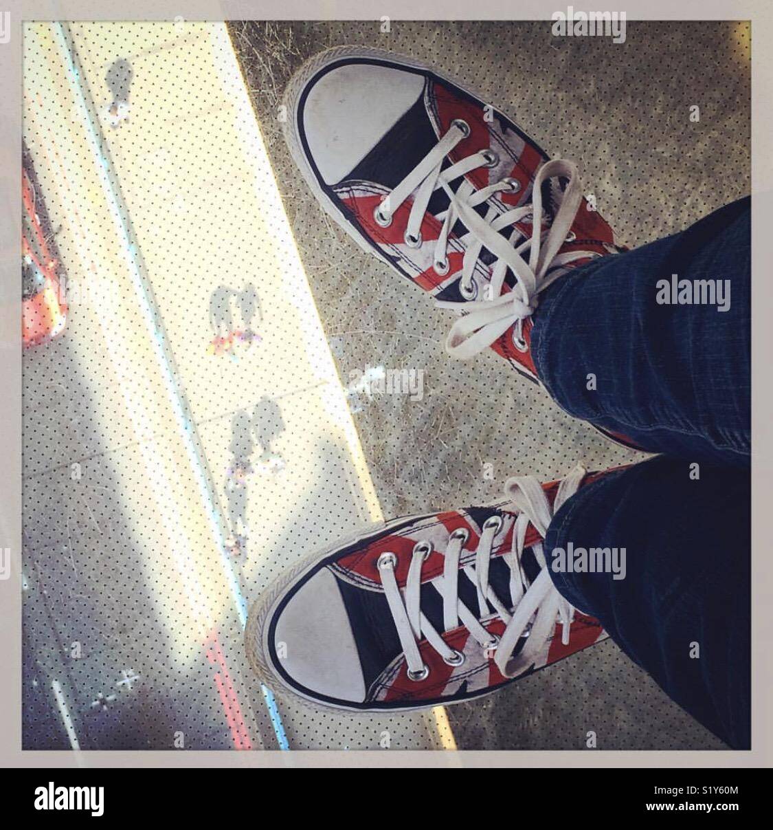 Union Jack converse running shoes at tower bridge Stock Photo - Alamy