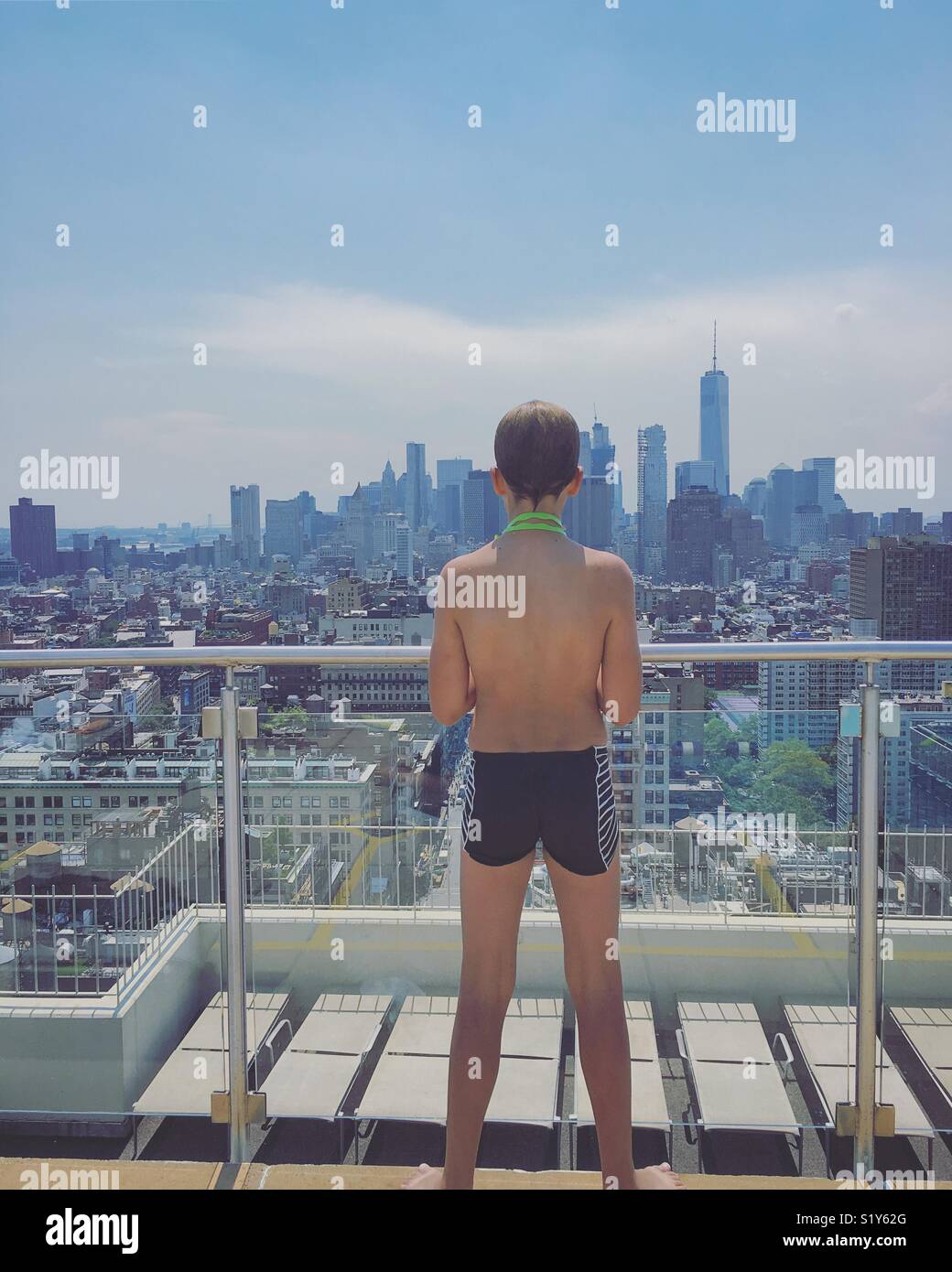 Boy looking over Manhattan Stock Photo Alamy