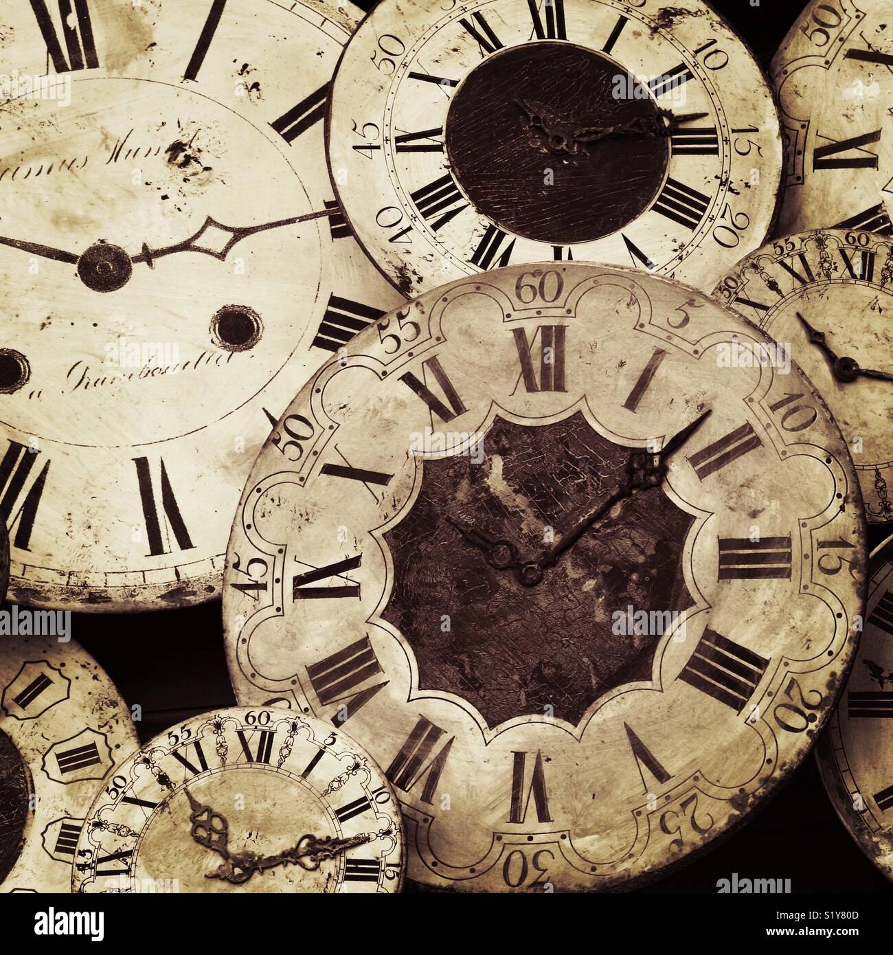 A collection of antique clock faces - Smartphone Captured Stock Image