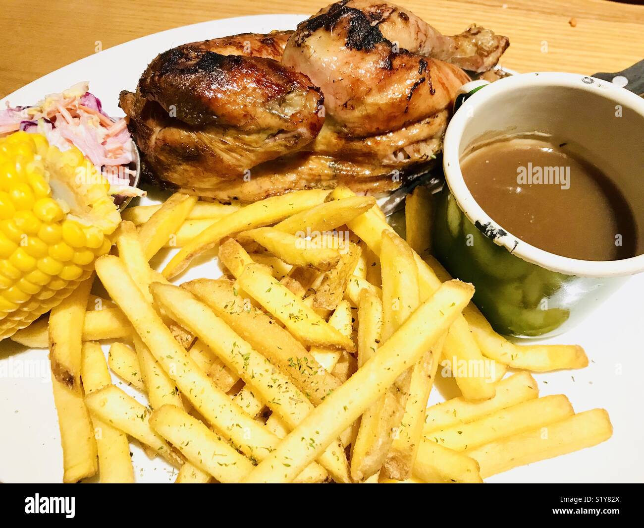 British pub food Harvester pub chain rotisserie chicken and fries