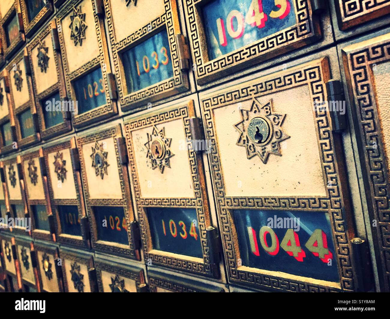 Rows of vintage post office boxes in a post office, USA - Smartphone Captured Stock Image