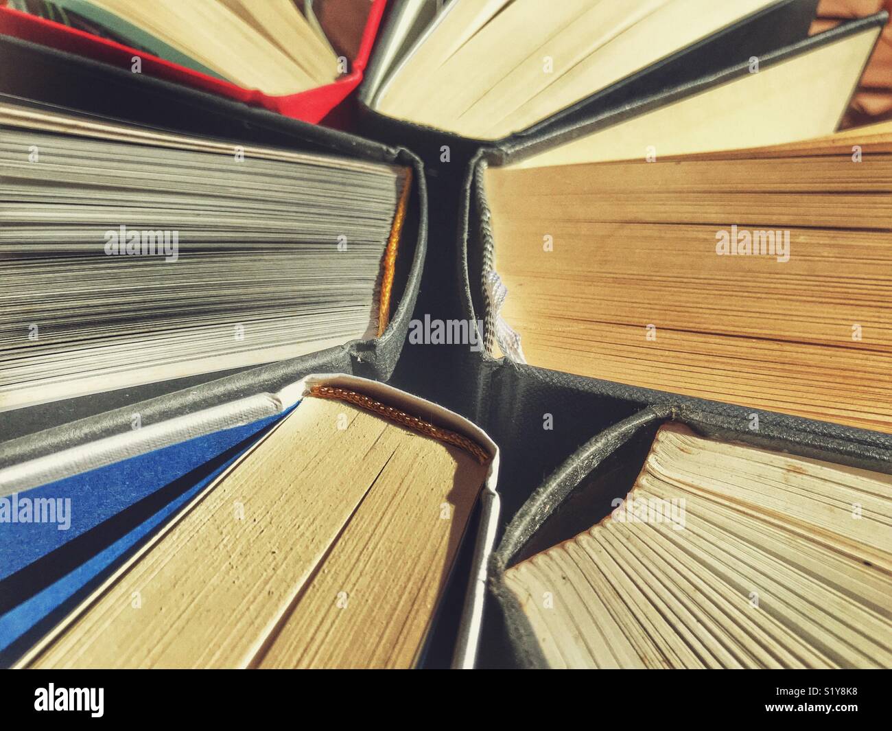 Hardback books, high angle view Stock Photo