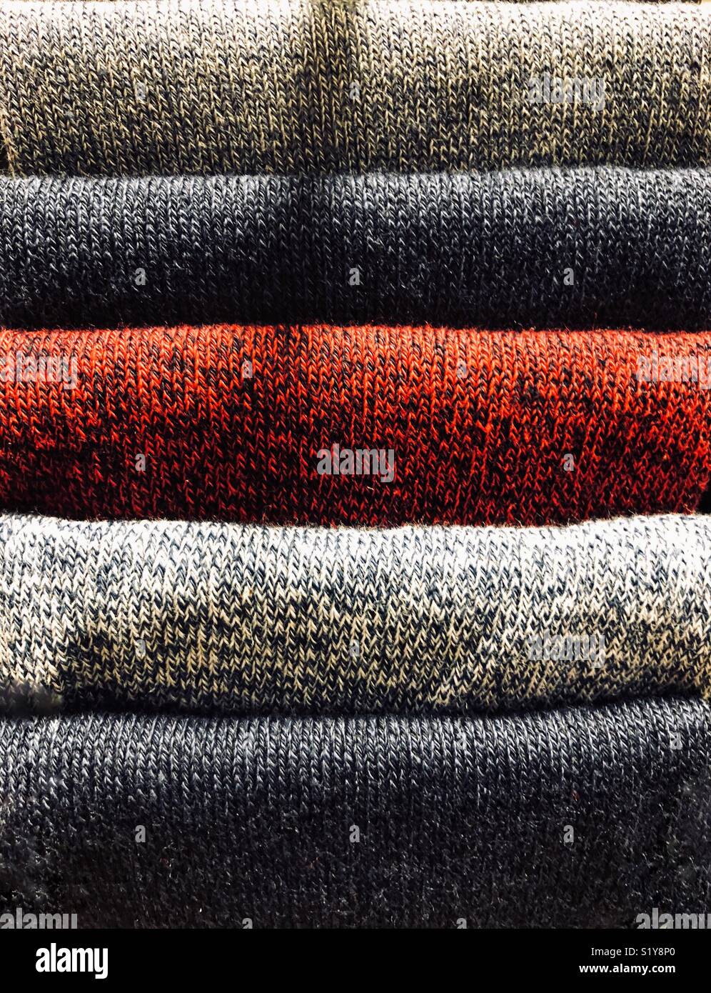 Abstract of quality folded coloured bath towels, stacked on top of each other. - Smartphone Captured Stock Image