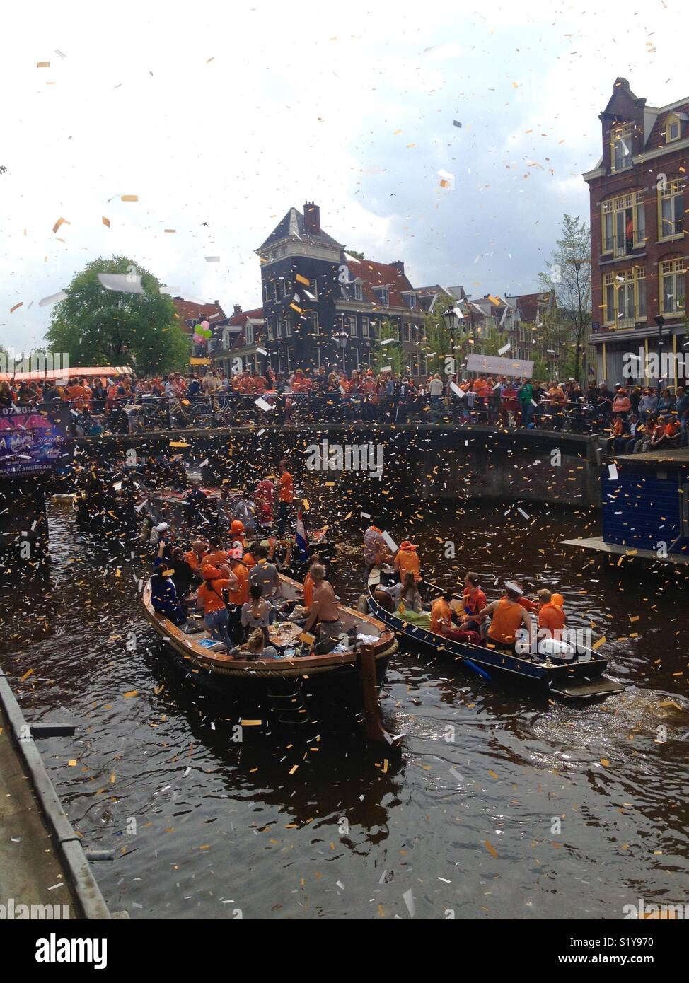 Canal parade in Amsterdam during Koningsdag. A Dutch national holiday. Stock Photo