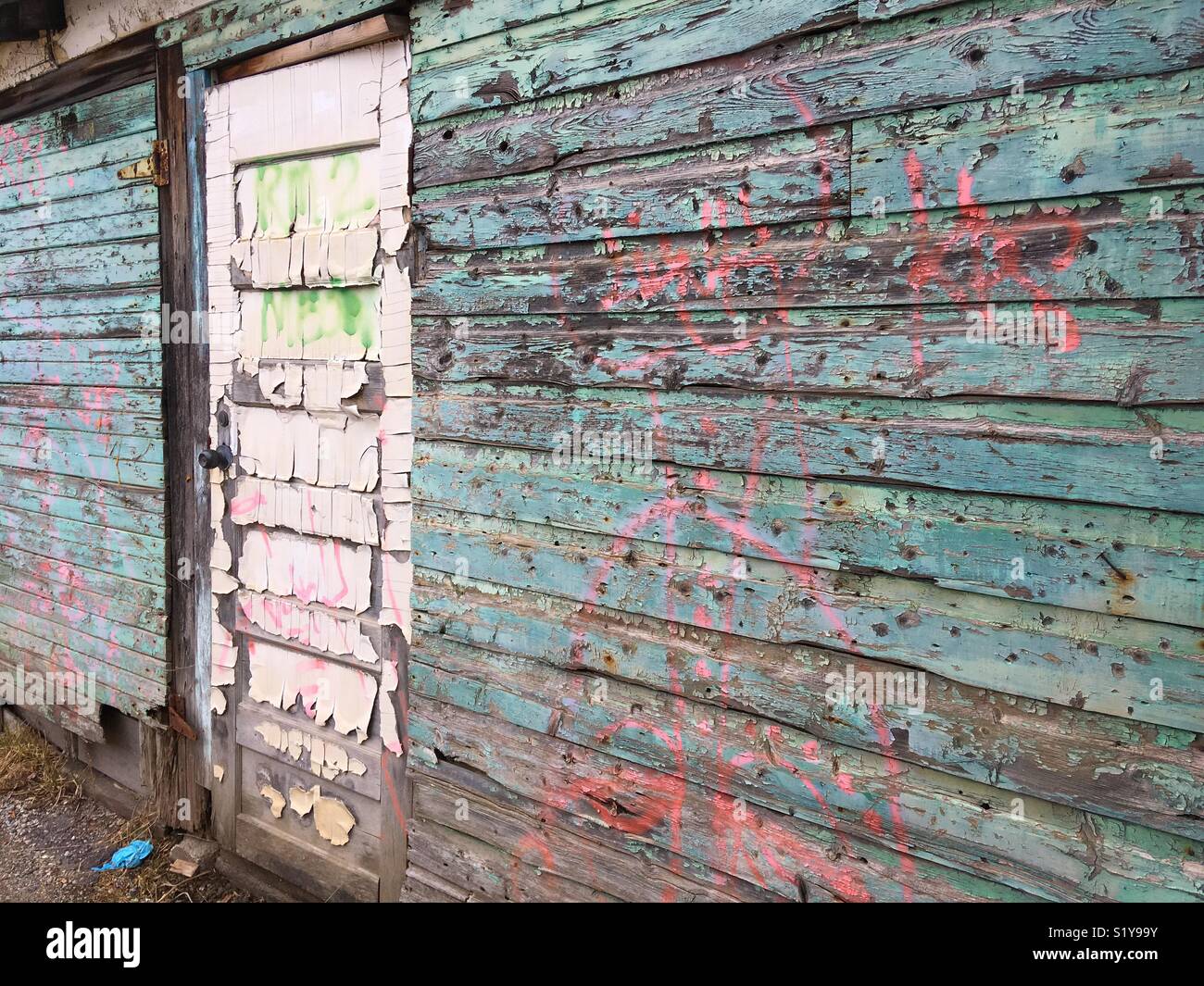Decrepit wall and door Stock Photo