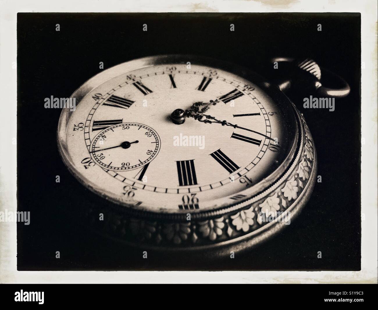 Monochromatic close-up of an old watch. - Smartphone Captured Stock Image
