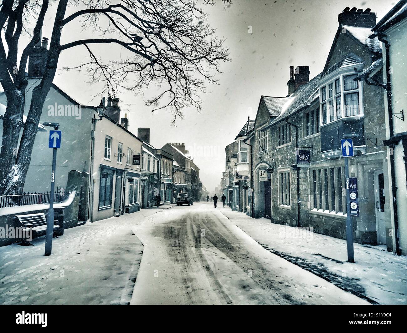 Cheap Street and winter  townscape with heavy snowfall in Sherborne, Dorset, England during the blizzard of Storm Emma, March 2018 - Smartphone Captured Stock Image