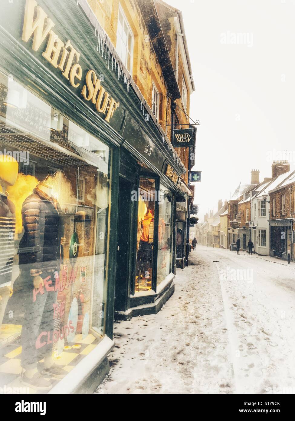 White Stuff in Cheap Street, with heavy snowfall in Sherborne, Dorset, England during the blizzard of Storm Emma, March 2018 - Smartphone Captured Stock Image
