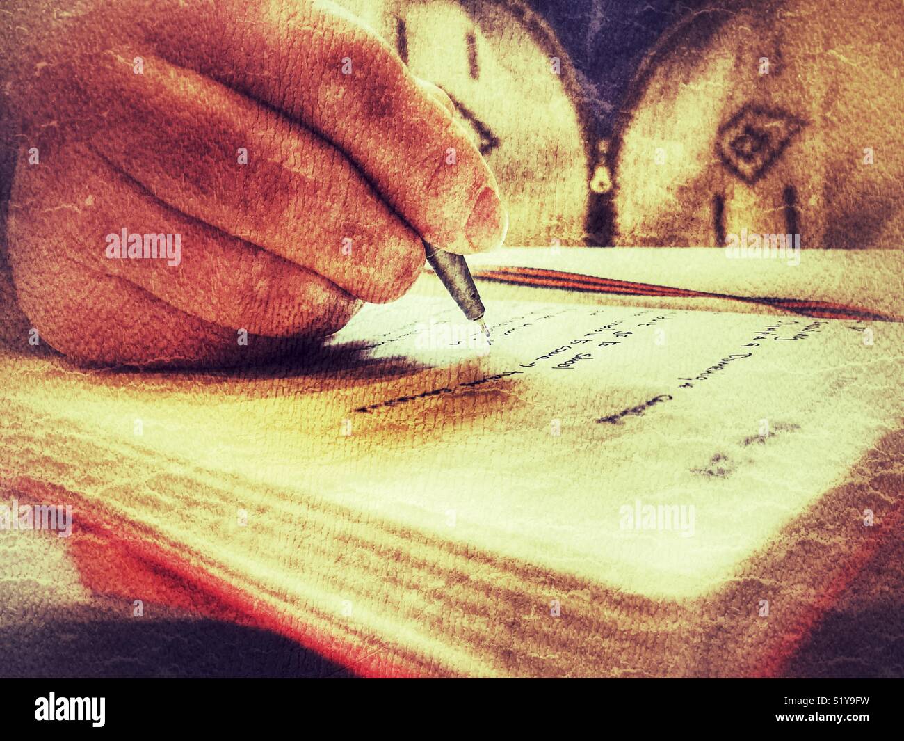 Writing in a journal, close up of pen in hand - Smartphone Captured Stock Image