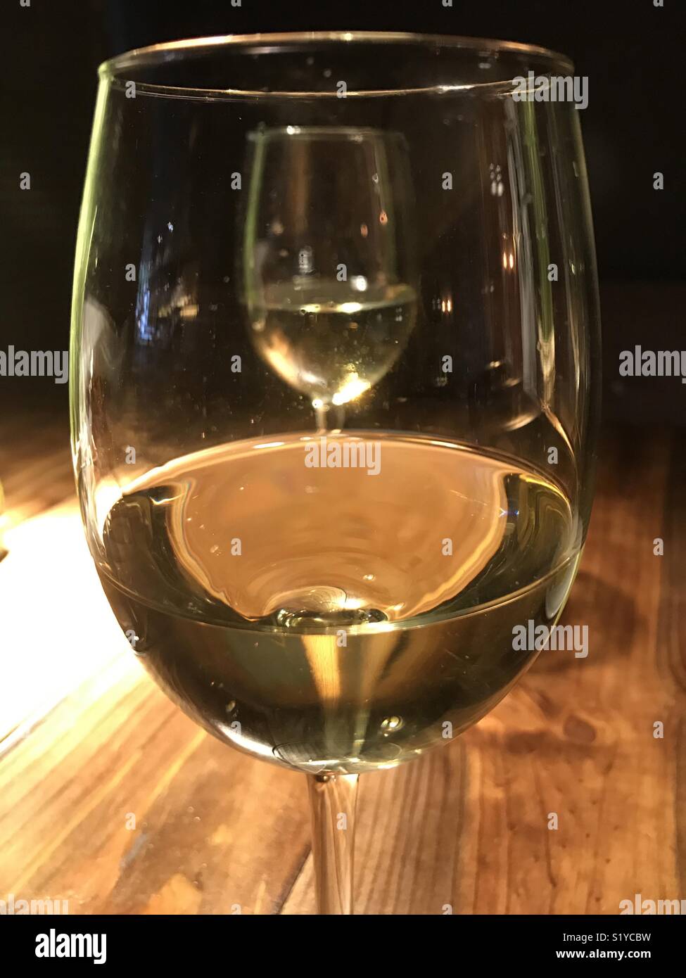 Two glasses of white wine. - Smartphone Captured Stock Image