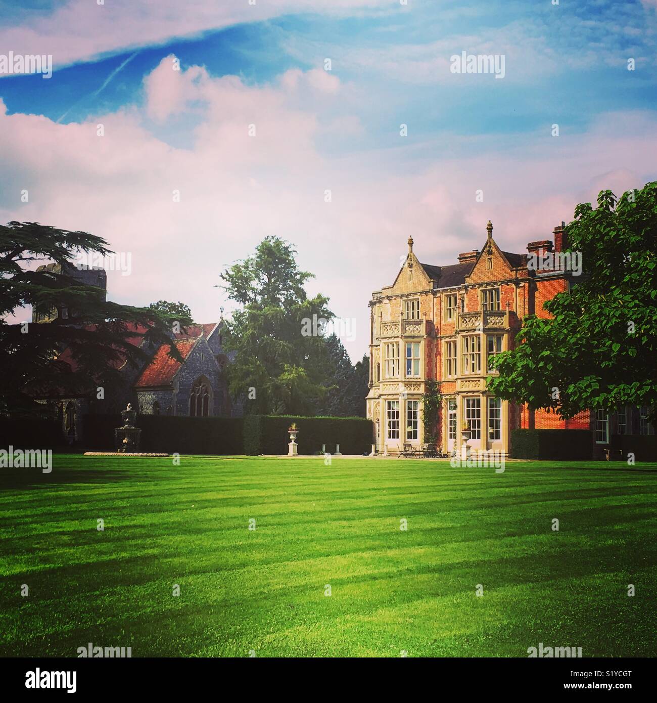 English country Manor House and lawn Stock Photo