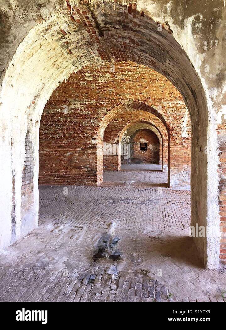 Vaulted arches of historic Fort Morgan, located in Mobile Bay, Alabama. Stock Photo