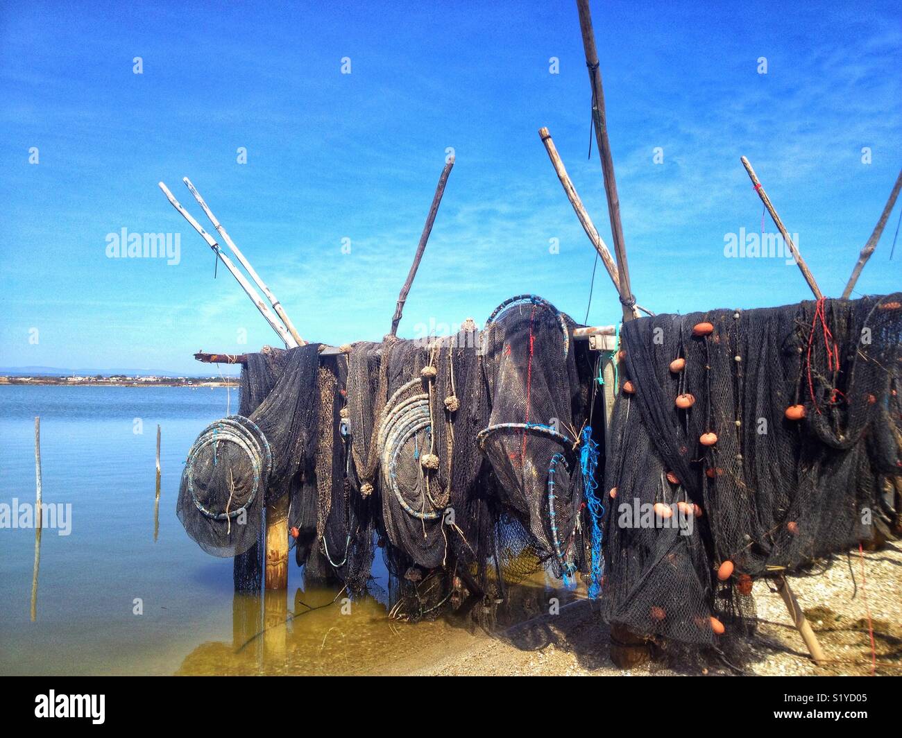 Drying fishing nets in the fishermen's huts, Villeneuve-Les-Maguelone, Occitanie France - Smartphone Captured Stock Image
