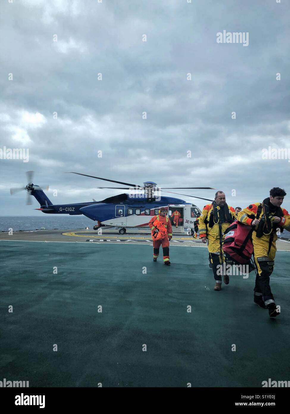 Sikorsky S92 helicopter landed on to a North Sea oil and gas platform -credit Lee Ramsden/ Alamy Stock Photo