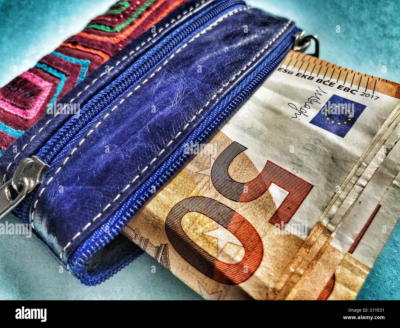 Leather purse stuffed full of €50 banknotes - Smartphone Captured Stock Image