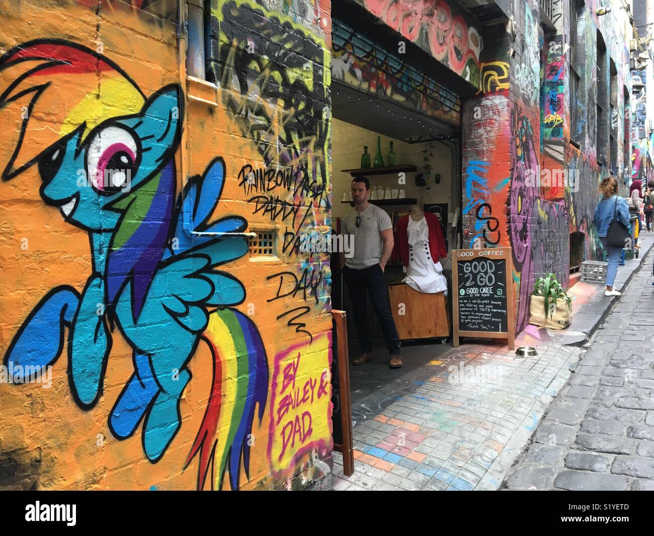 Hosier Lane in Melbourne with coffee shop and street art - Smartphone Captured Stock Image