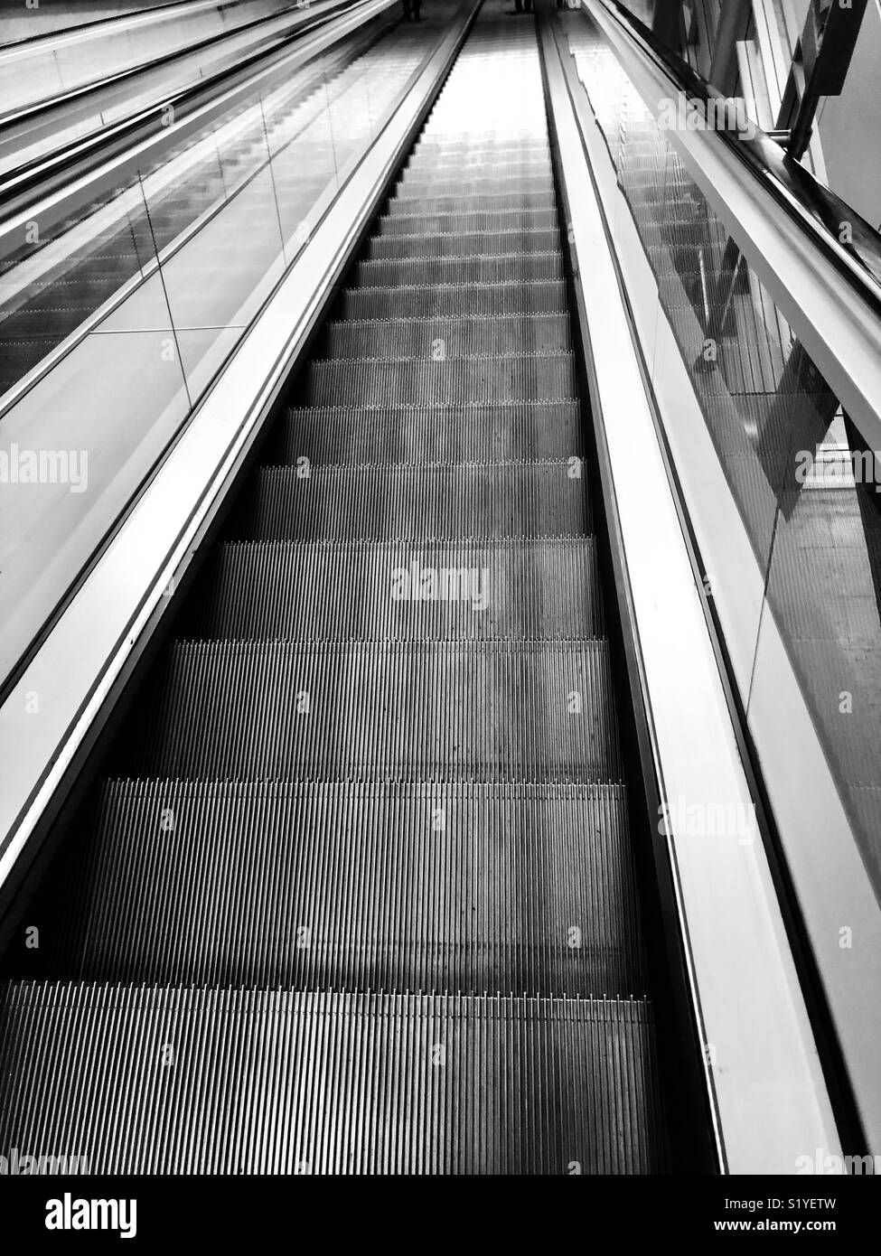 The Down Escalator - Smartphone Captured Stock Image