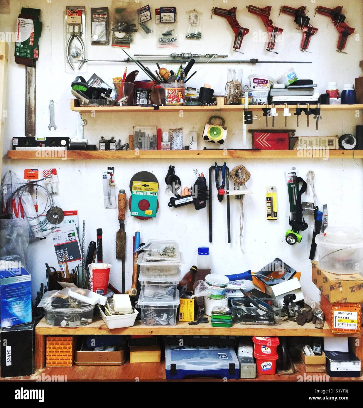 The wall of tools in the workshop Stock Photo