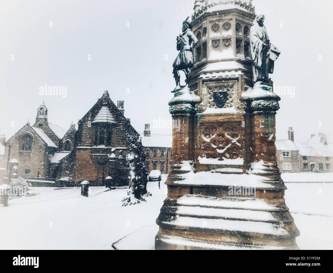 UK Weather: Sherborne, Dorset. Snow falls on the Digby Memorial in the historic market town of Sherborne as the so called mini Beast from the East brings another icy blast to the South West. - Smartphone Captured Stock Image