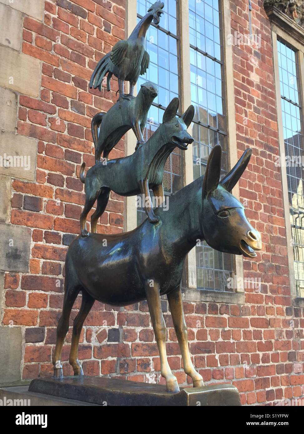 The Bremen Town Musicians (Die Bremer Stadtmusikanten) - bronze sculpture  of the animals from the Grimm Brothers fairytale by artist Gerhard Marcks  before the town hall in Bremen Germany. 1953 Stock Photo - Alamy