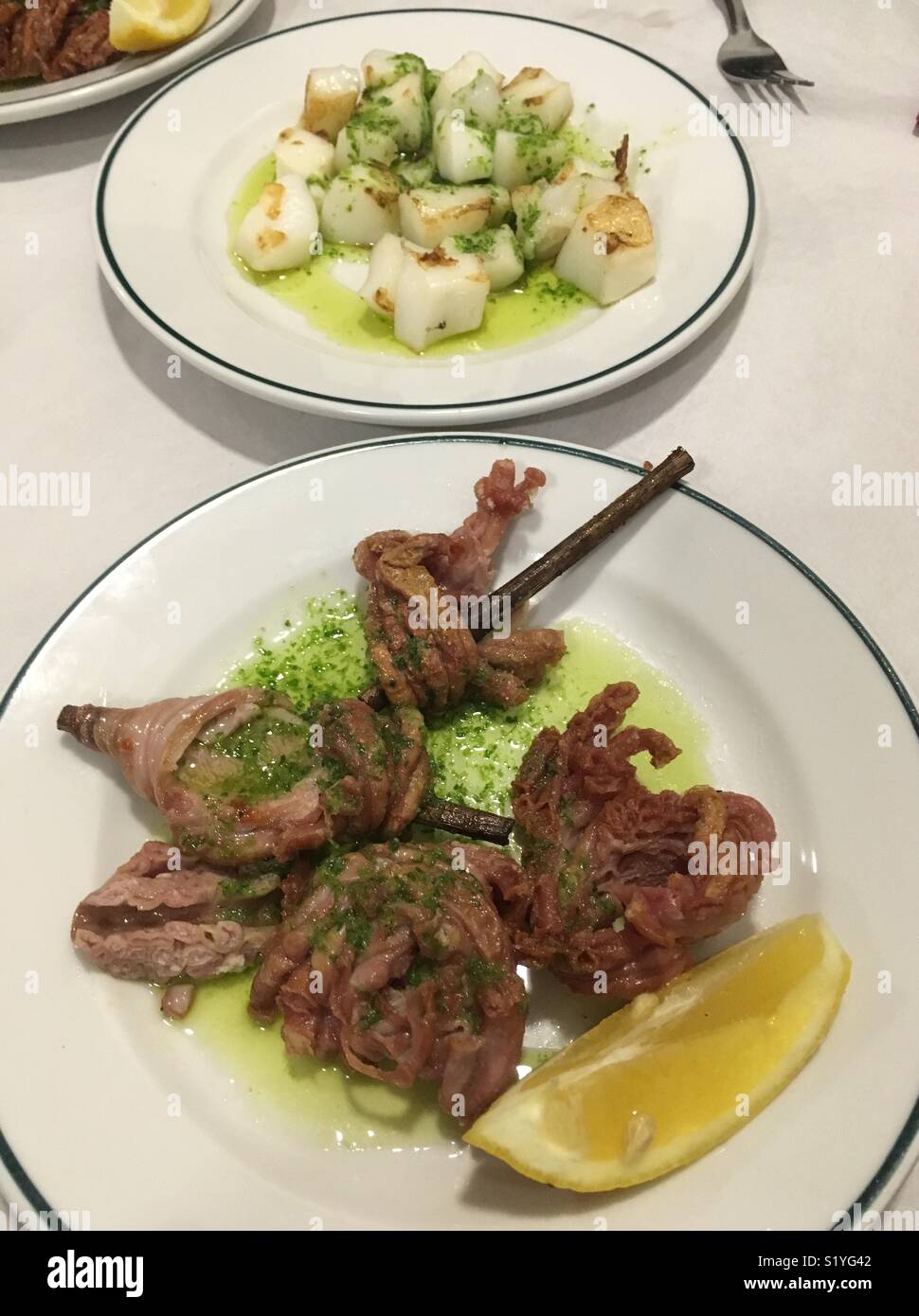 Spanish dish Zarajos   Fried lamb intestine and sepia sea food - Smartphone Captured Stock Image