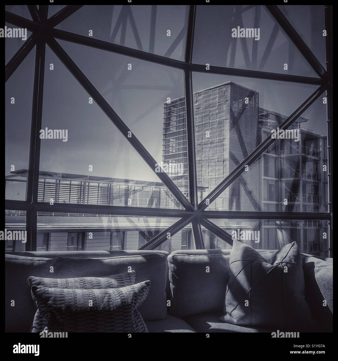 The newly opened Zeitz MOCAA Food restaurant and bar in the Zeitz Museum, Cape Town, South Africa with its iconic bubble windows. - Smartphone Captured Stock Image