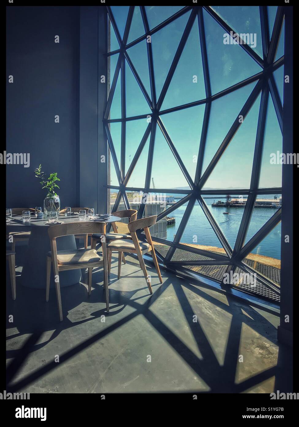 The newly opened Zeitz MOCAA Food restaurant and bar in the Zeitz Museum, Cape Town, South Africa with its iconic bubble windows. - Smartphone Captured Stock Image
