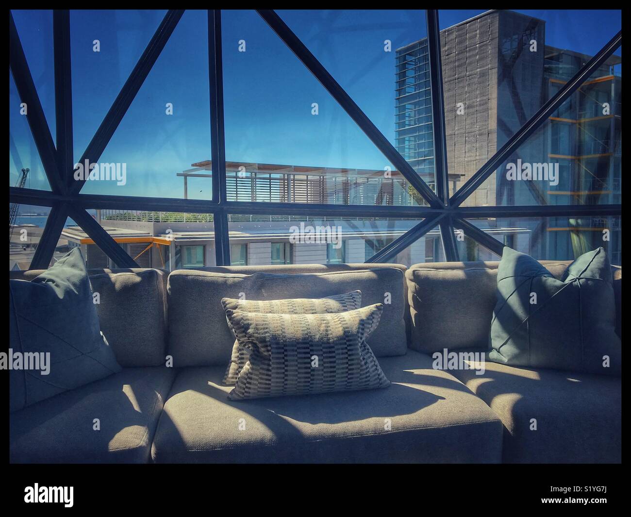 The newly opened Zeitz MOCAA Food restaurant and bar in the Zeitz Museum, Cape Town, South Africa with its iconic bubble windows. - Smartphone Captured Stock Image