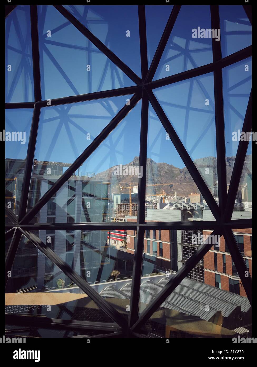 View from the newly opened Zeitz MOCAA Food restaurant and bar in the Zeitz Museum, Cape Town, South Africa with its iconic bubble windows. - Smartphone Captured Stock Image