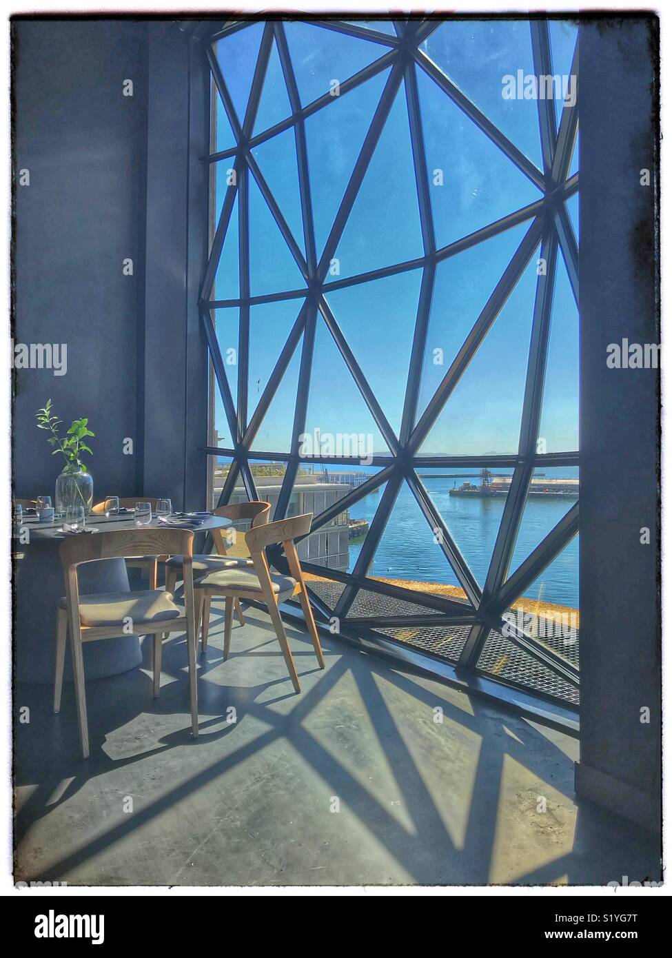 The newly opened Zeitz MOCAA Food restaurant and bar in the Zeitz Museum, Cape Town, South Africa with its iconic bubble windows. - Smartphone Captured Stock Image