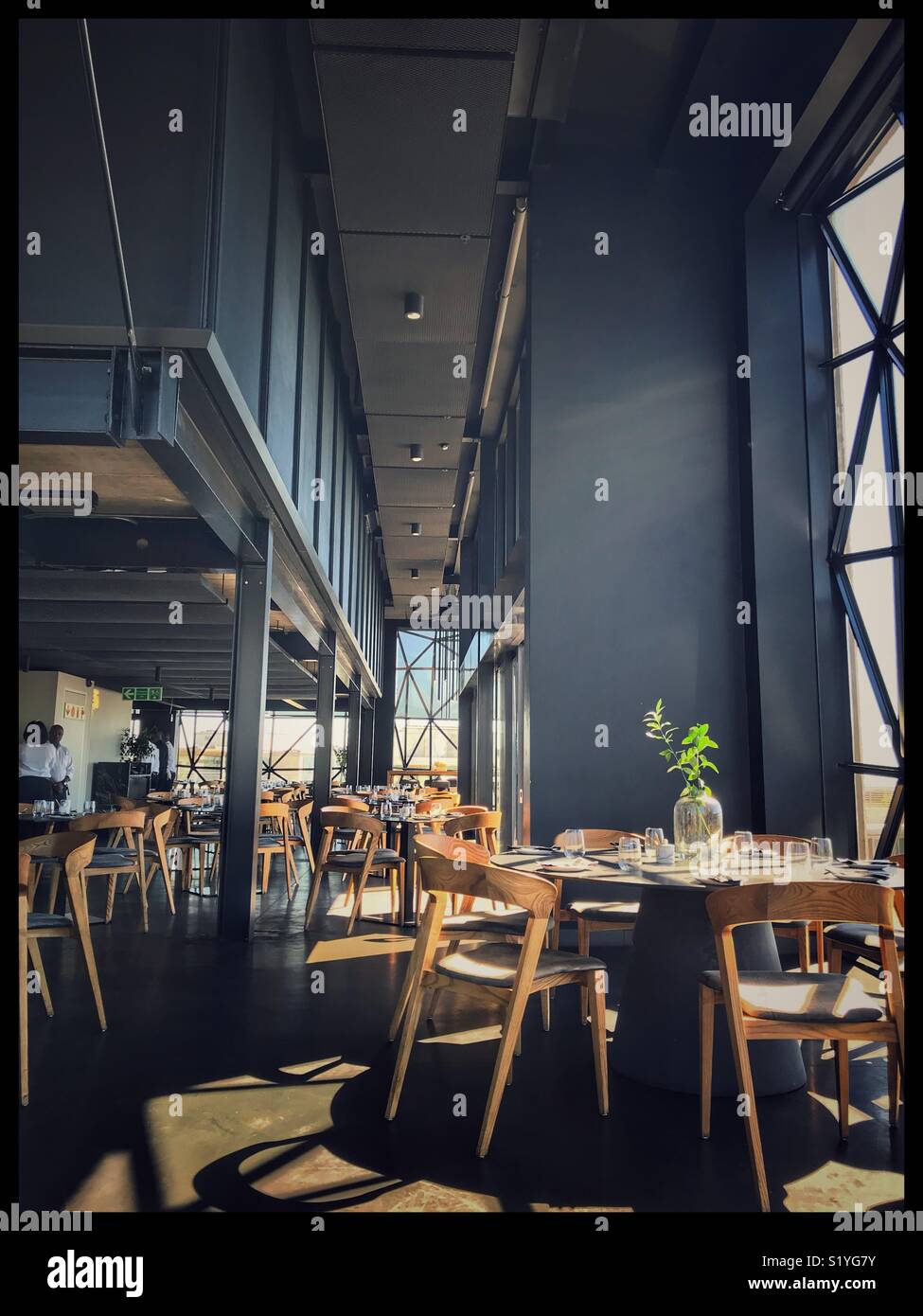 The newly opened Zeitz MOCAA Food restaurant and bar in the Zeitz Museum, Cape Town, South Africa with its iconic bubble windows. - Smartphone Captured Stock Image