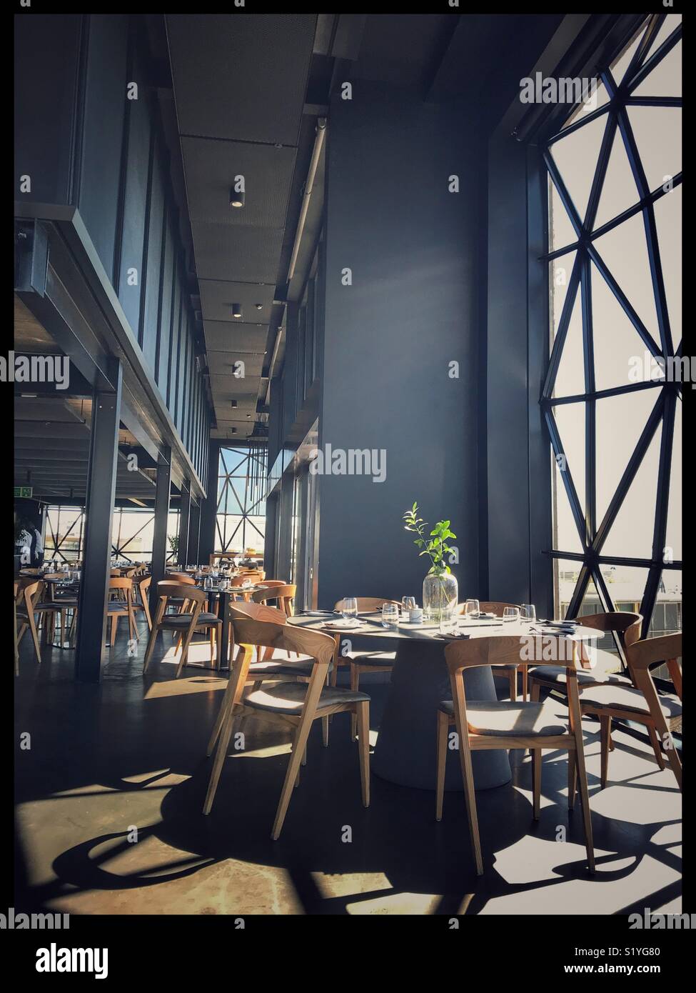The newly opened Zeitz MOCAA Food restaurant and bar in the Zeitz Museum, Cape Town, South Africa with its iconic bubble windows. - Smartphone Captured Stock Image