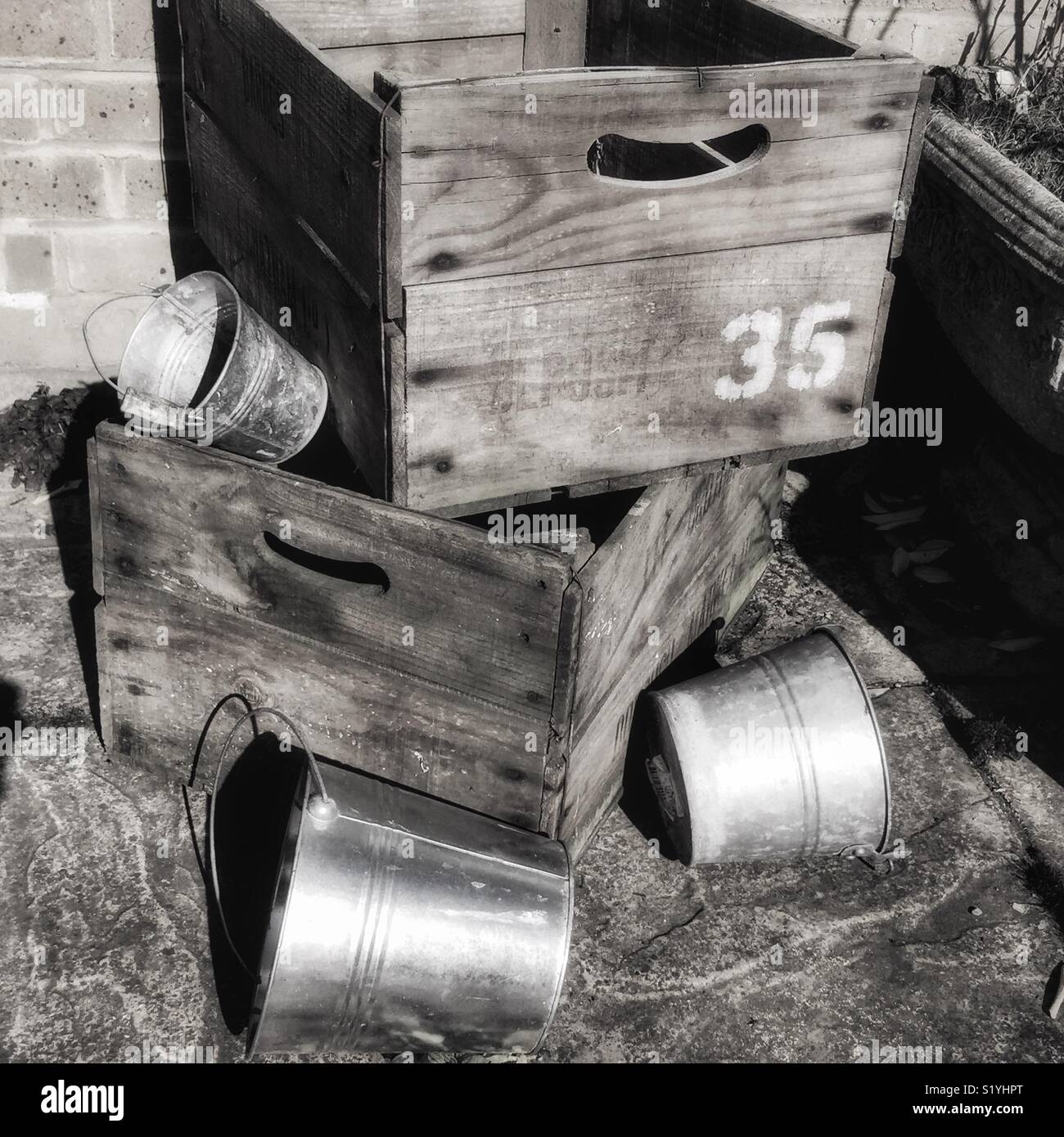 Wooden crates and aluminium flowerpots in the garden - Smartphone Captured Stock Image